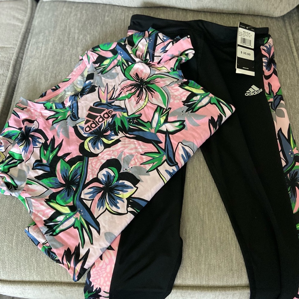 Girls Adidas Size 12 shirt and 16 leggings athletic/leisure wear. New with tags.